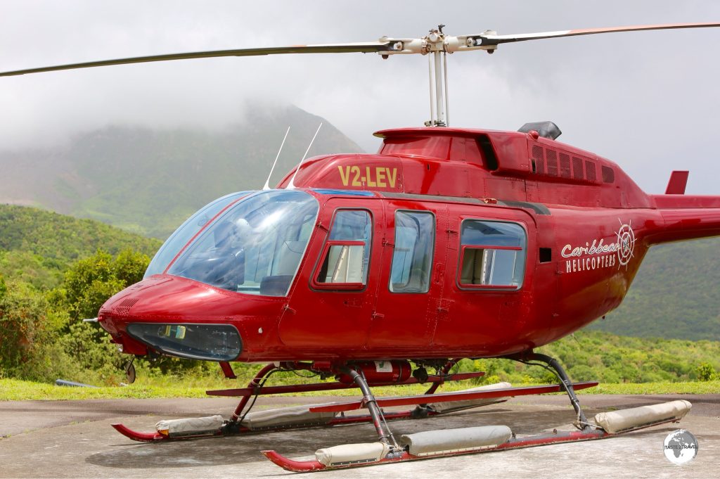 Scientists at the Montserrat Volcano Observatory monitor the volcano using different means including a helicopter.
