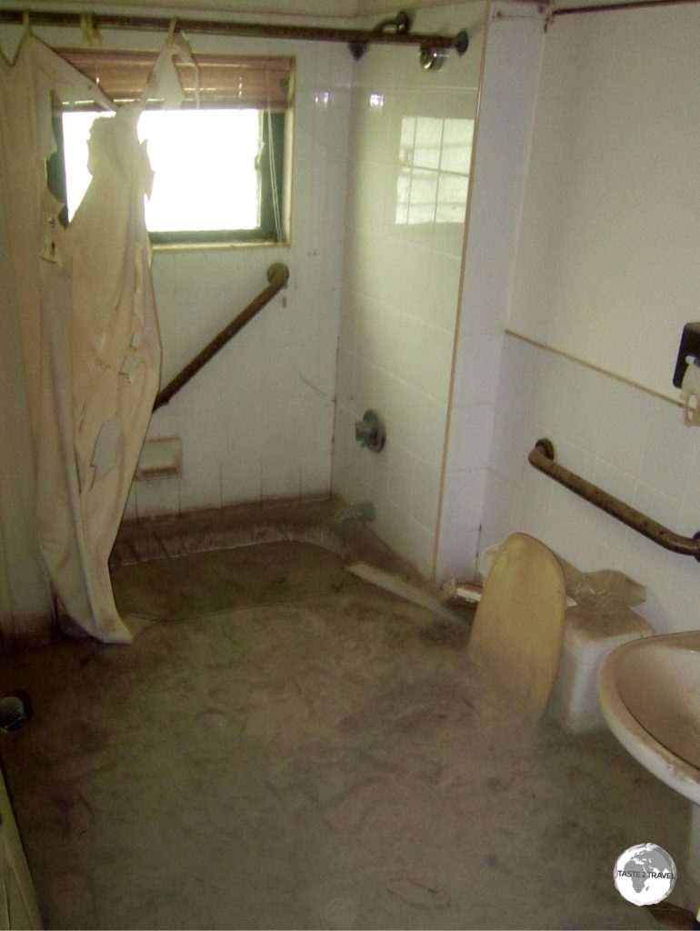 A former bathroom at the Montserrat Springs hotel now has many plumbing issues thanks to being inundated by volcanic mud flows and ash.