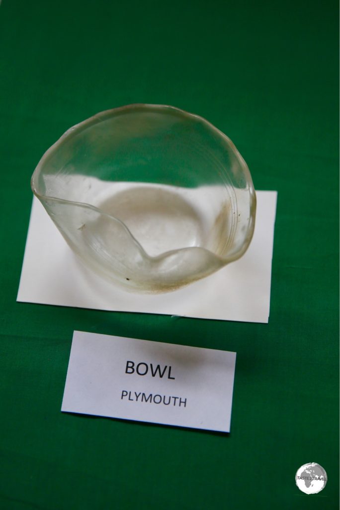 A display at the Montserrat National Trust shows a glass bowl, bent out of shape, by the heat of a pyroclastic flow which devastated Plymouth.