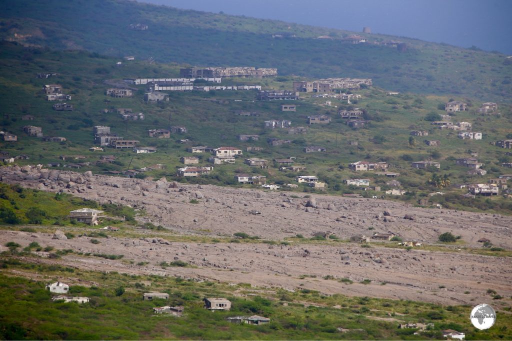 A view of Plymouth from Garibaldi hill shows the path cut through the capital by the pyroclastic flows and lahars.