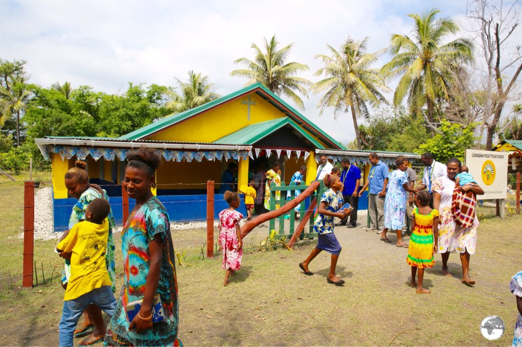 Attending church in the village of Louna Sunan.