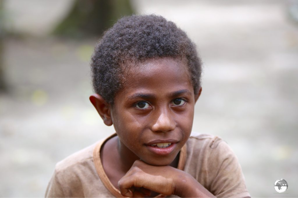 One of the many friendly village children on Malo Island.