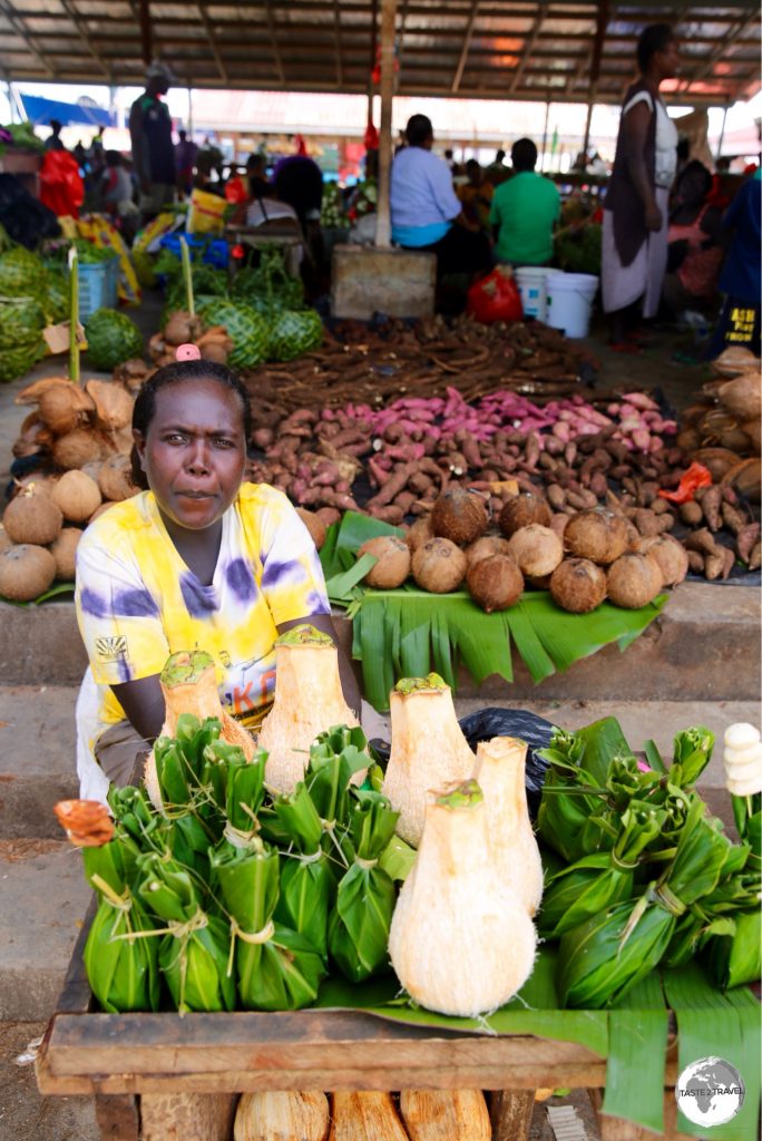 A seller at Gizo market.