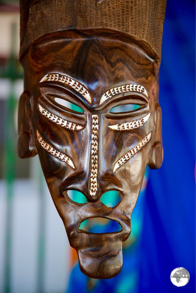 Carved masks are popular souvenirs.