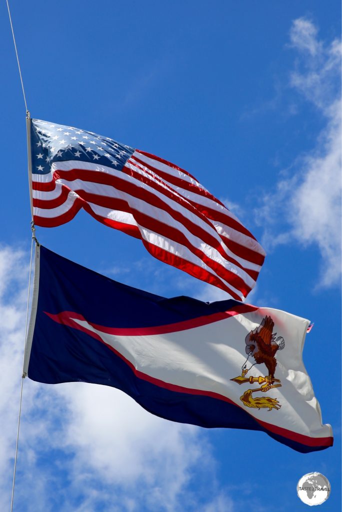 The territorial flag of American Samoa flies underneath the US "Stars and Stripes" in Pago Pago.