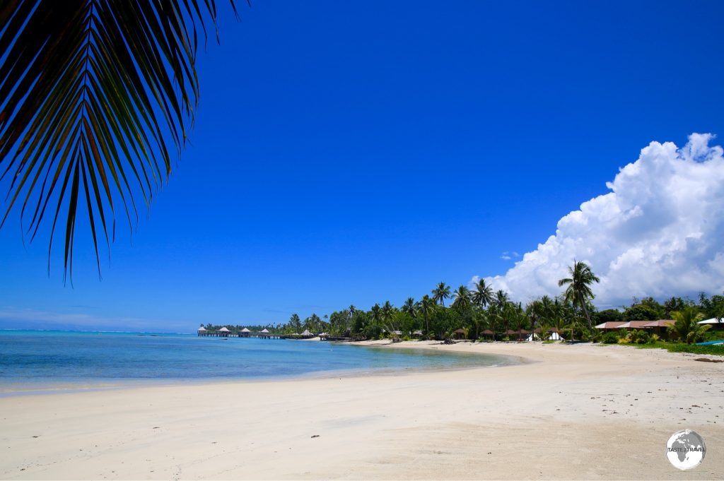 Beautiful Maninoa beach lies between Sinalei Reef Resort & Spa and Coconuts Beach Club Resort & Spa (background).