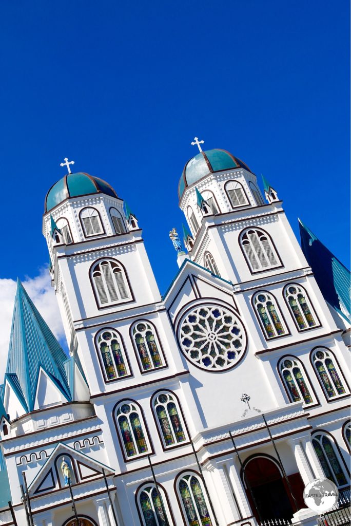 The imposing exterior of the Immaculate Conception Cathedral dominates the skyline of Apia.