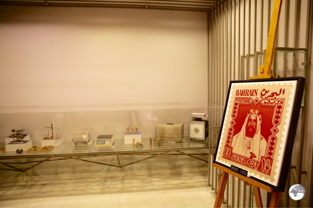 A display at the Postal Museum features the first stamp issued by Bahrain in 1953.