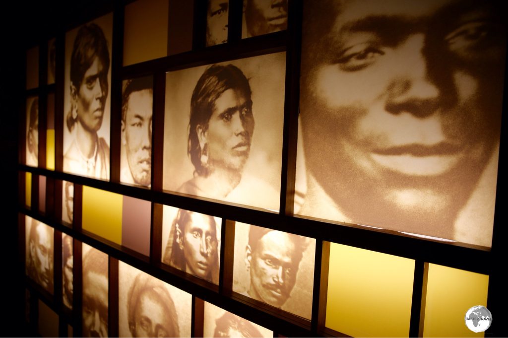 Photos of Indian indentured labourers at the Aapravasi Ghat museum.