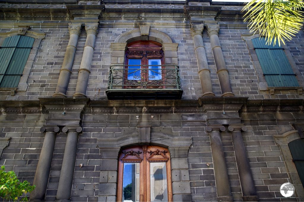 Most colonial-era buildings in Port Louis are constructed from black basalt stone.