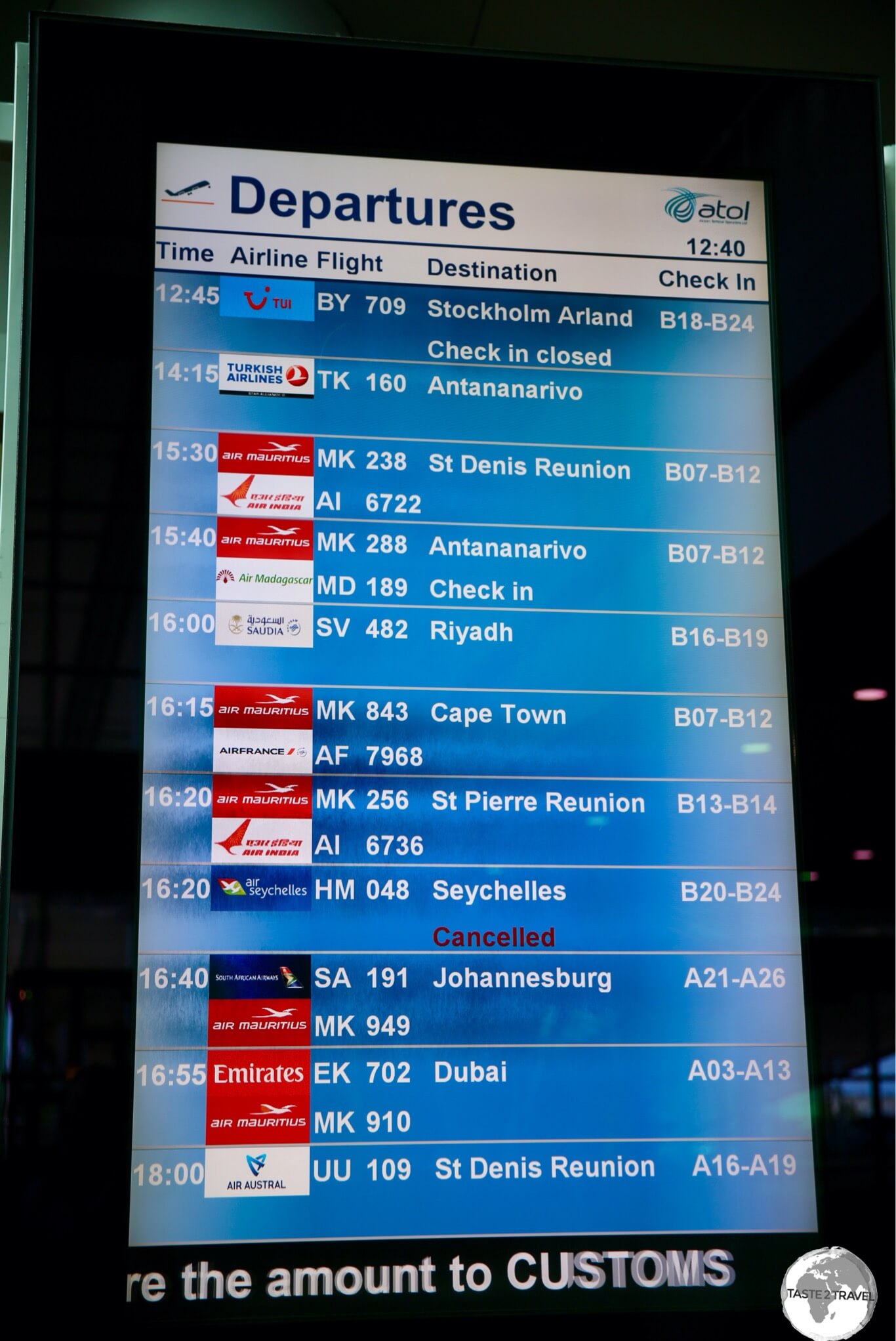 Departure board at Sir Seewoosagur Ramgoolam International Airport.