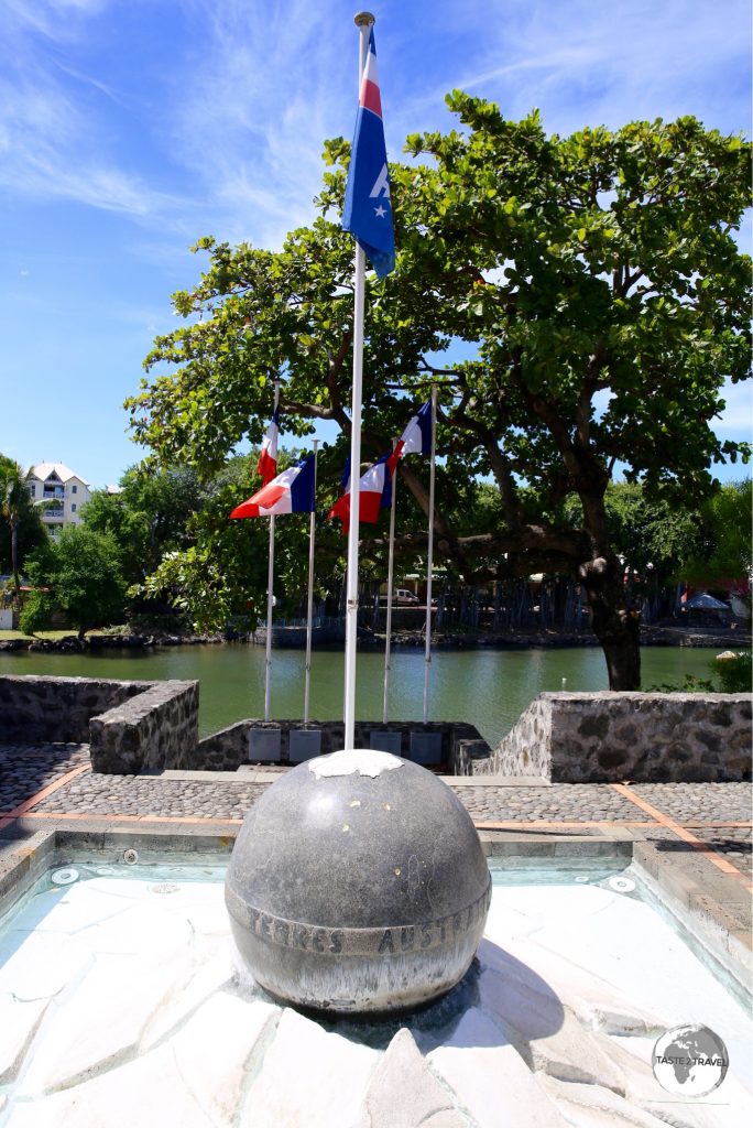 A monument at the TAAF information centre in St. Pierre shows the location of the territories on a globe.
