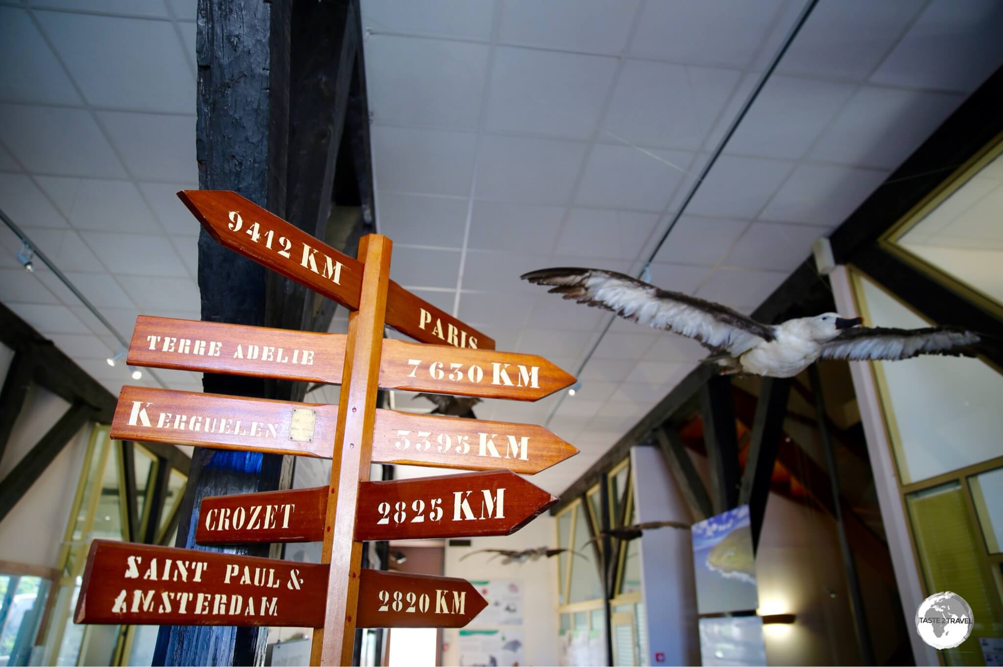A marker inside the TAAF Information centre indicates distances to the various French Antarctic islands from St. Pierre.