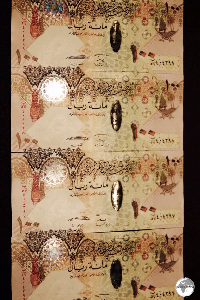 Qatari 100 Riyal notes.