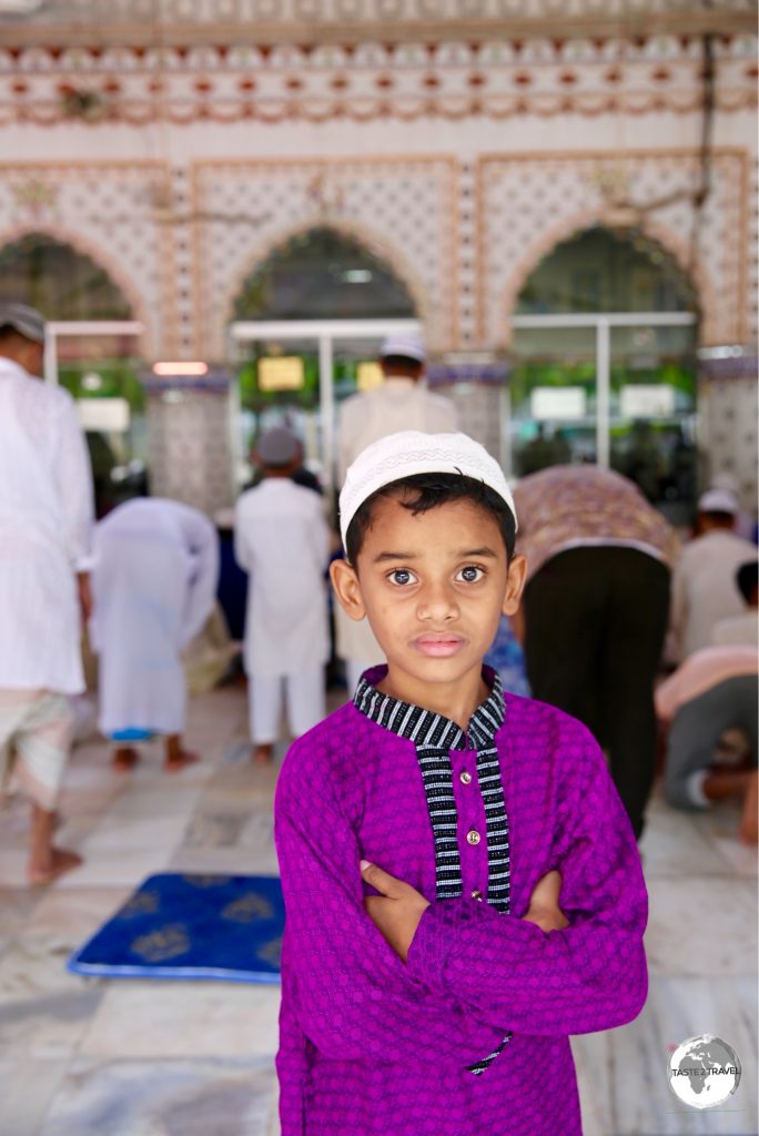 A young worshipper at the Tara mosque in Old Dhaka.
