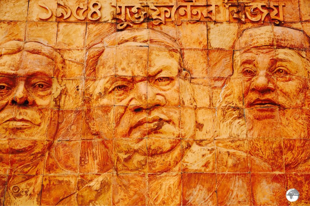 Terracotta panels at the entrance to the Independence museum feature Sheikh Mujibur Rahman, the founding father of Independent Bangladesh.
