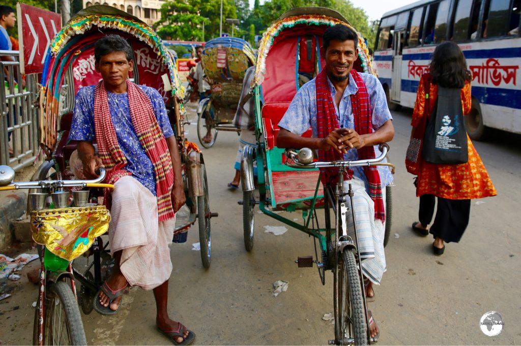 Just two of the estimated 800,000 bicycle rickshaws in Dhaka.