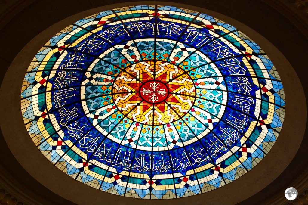 The beautiful stained-glass dome at the Beit Al Quran museum mosque.