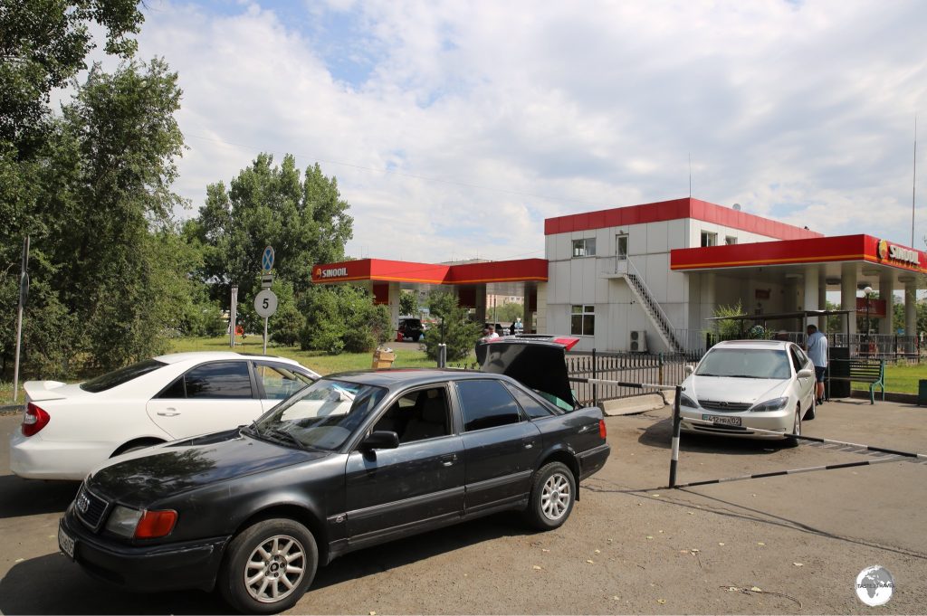 Shared taxis for Bishkek waiting at Sayran bus station in Almaty.