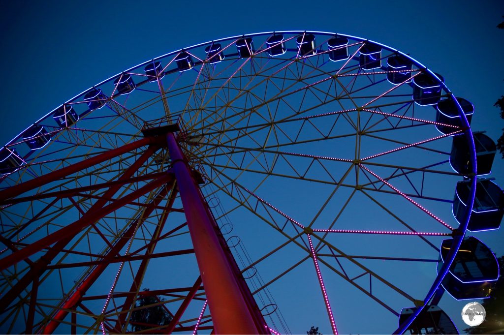 The Ferris wheel is one of many affordable amusements at Panfilov park.