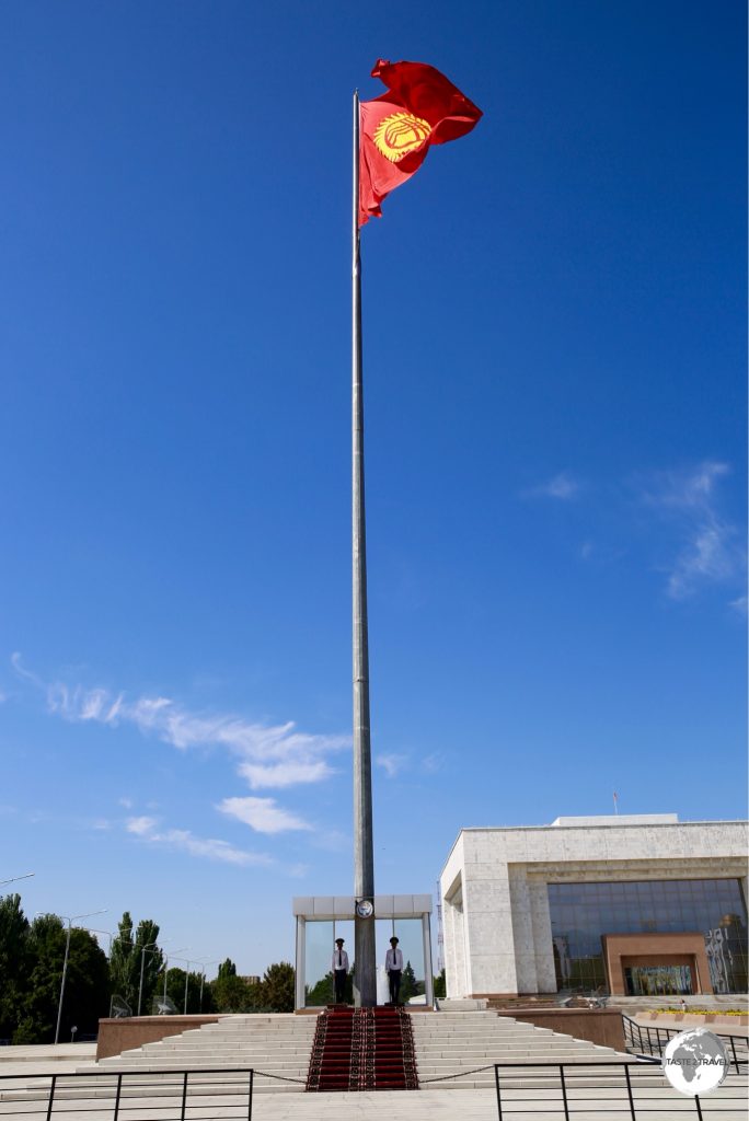 The flagpole on Bishkek's Ala-Too square is guarded during daylight hours.