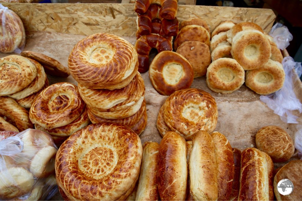Karakol is famous for its ‘mai tokoch’, a round Uighur-style bread which is baked in a clay tandoori oven – seen here at Karakol market.