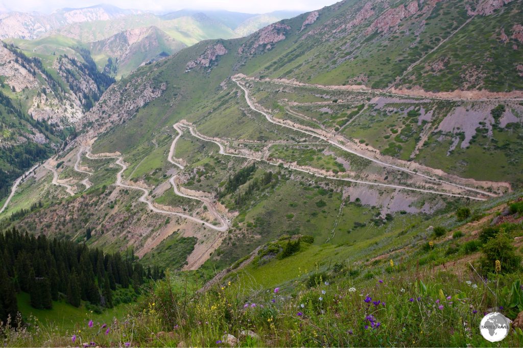 The road which leads to Moldo-Ashuu pass, a high mountain pass which sits at an elevation of 3,346 m (10,977 feet)