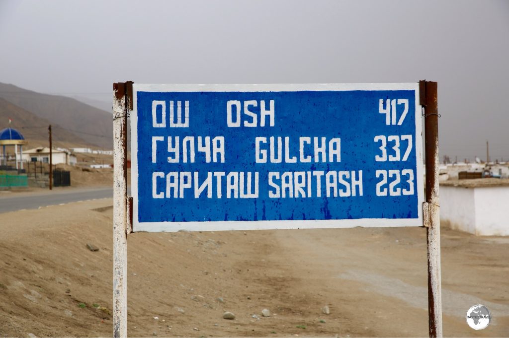 A road sign in Murgab indicates distances to towns further north.