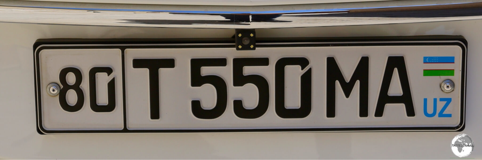 An Uzbekistan car license plate.