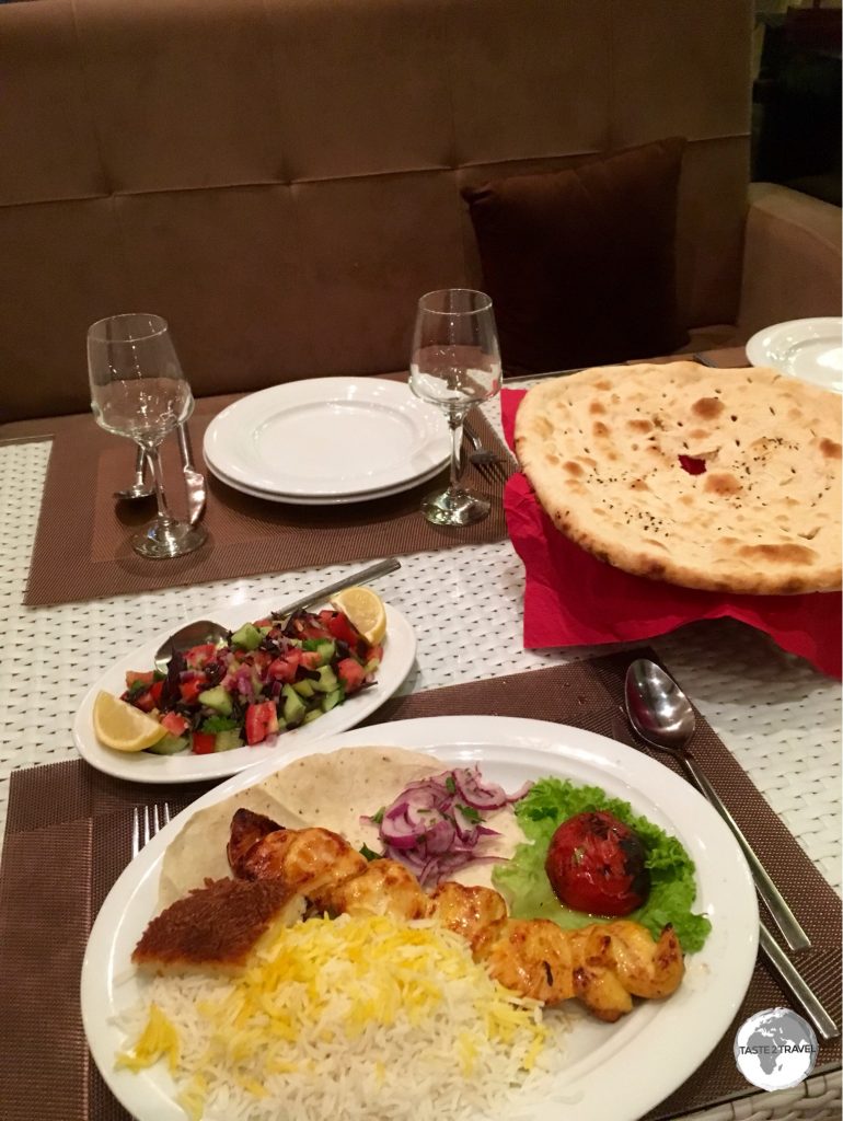 A typical meal in Azerbaijan – BBQ’d meat, salad, bread and some rice.