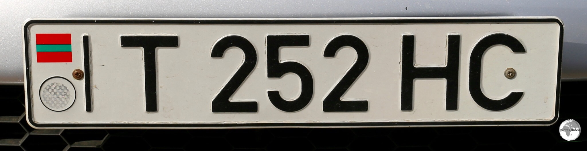 The license plate of Transnistria features the flag and also indicates which district the car is from, with 'T' representing Tiraspol.