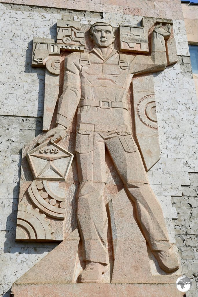 An incredible 'CCCP' stone mosaic on the wall of a factory in Bender.