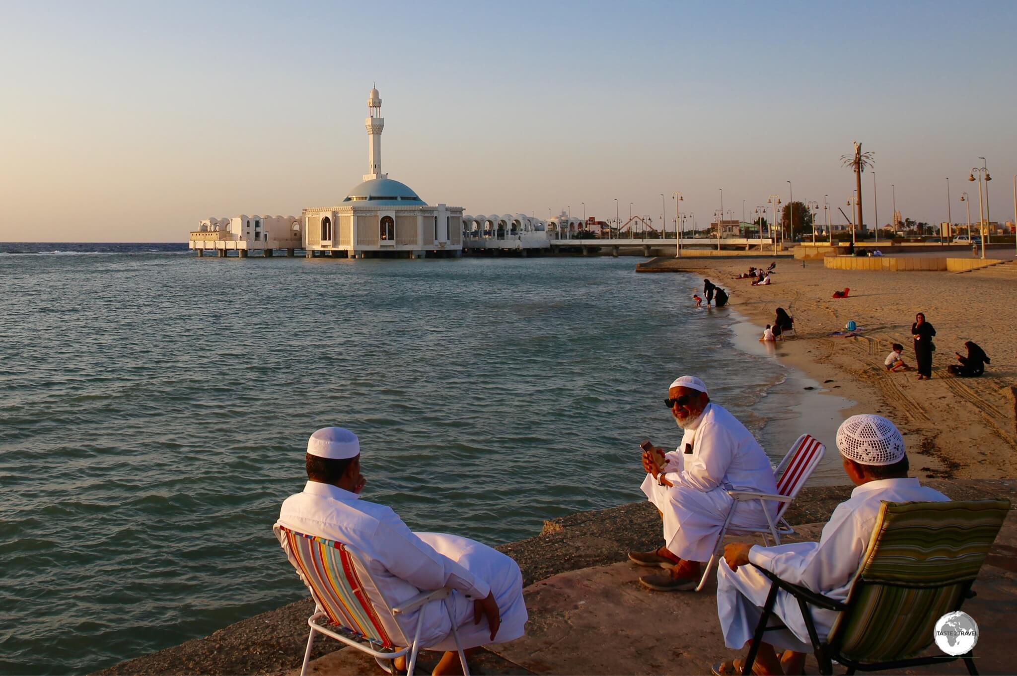 Locals enjoying a Red Sea sunset near the Floating mosque.