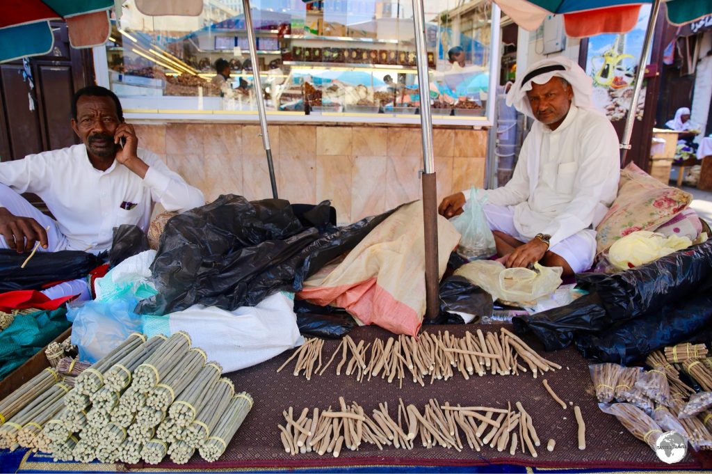 Miswak vendor in Jeddah old town. Used in the region for more than 7,000 years, 'miswak' is a teeth cleaning twig which comes from the Arak tree.