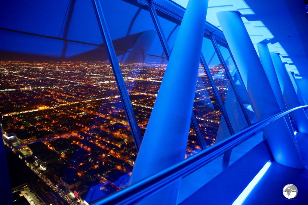 A night time view of Riyadh from a very ‘blue’ Sky bridge at Kingdom Centre.