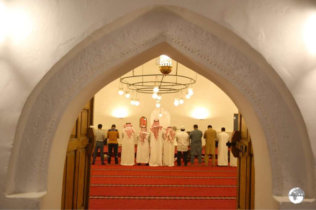 Worshippers inside the historic Al-Qubba mosque at Ibrahim Palace.