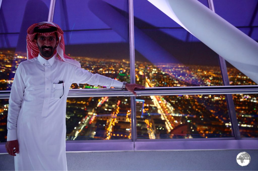 A Saudi visitor at Kingdom Tower in Riyadh wearing his white 'Thobe'.