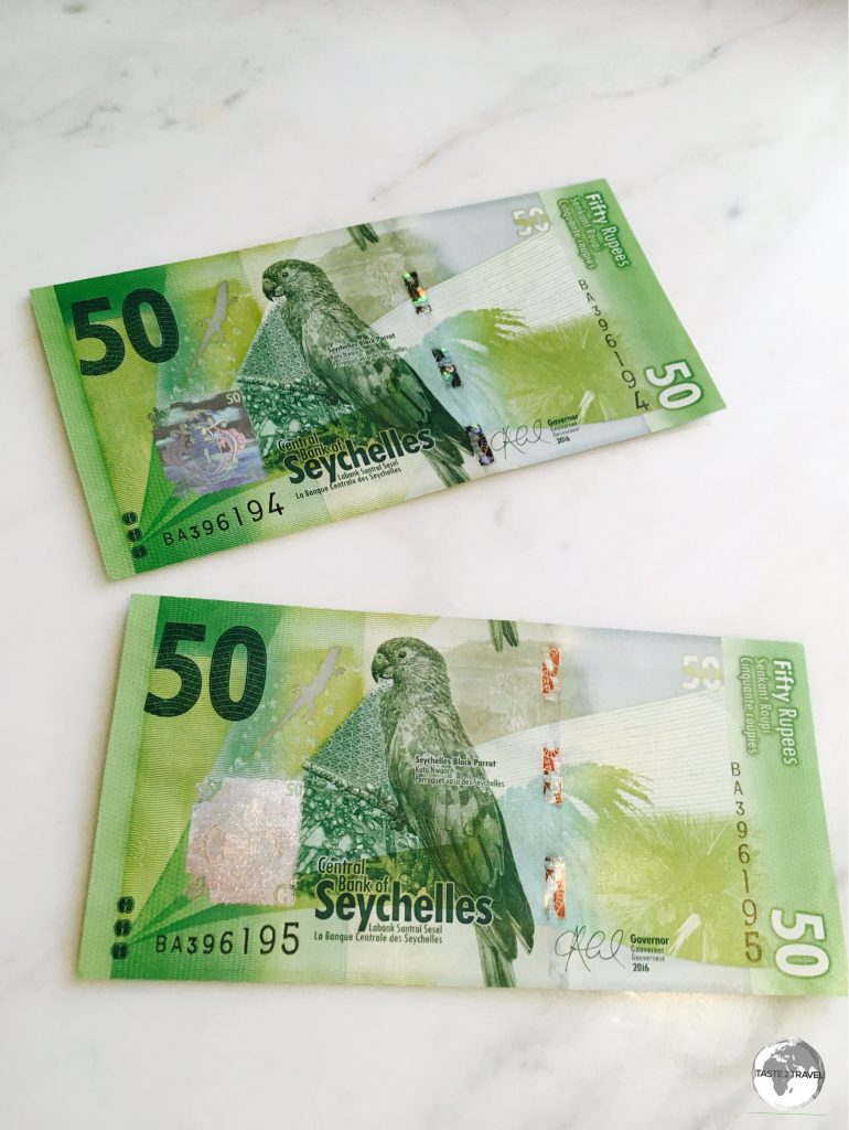 The front of the Seychelles 50 rupee note features the Black Parrot.