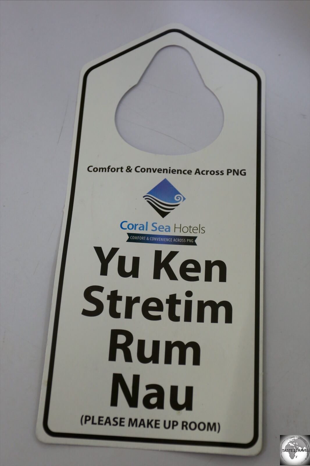 A Pidgin English hotel room service sign.