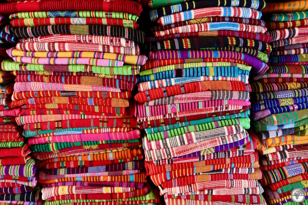 Bundles of colourful Tais cloth for sale in Dili.