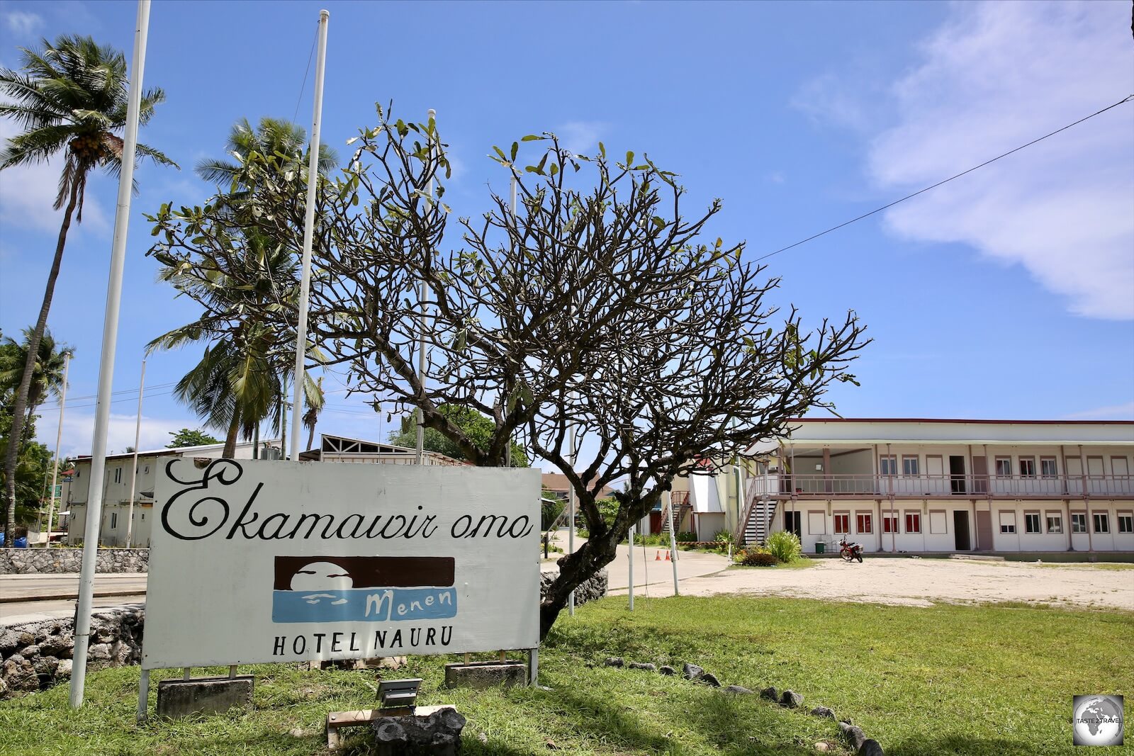 The entrance to the Menen hotel, with a wing of 'Shipping container' rooms visible on the right.