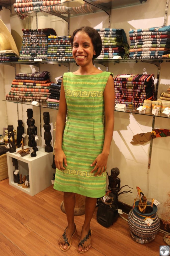 Ana, one of the friendly staff members at Things and Stories, modelling a beautiful dress made from Timorese Tais cloth.