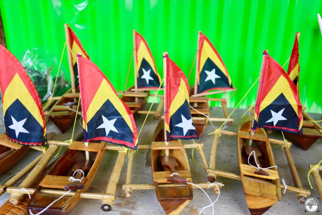 Souvenir model boats for sale at the Tais market, with sails made from tiny Timor-Leste flags.