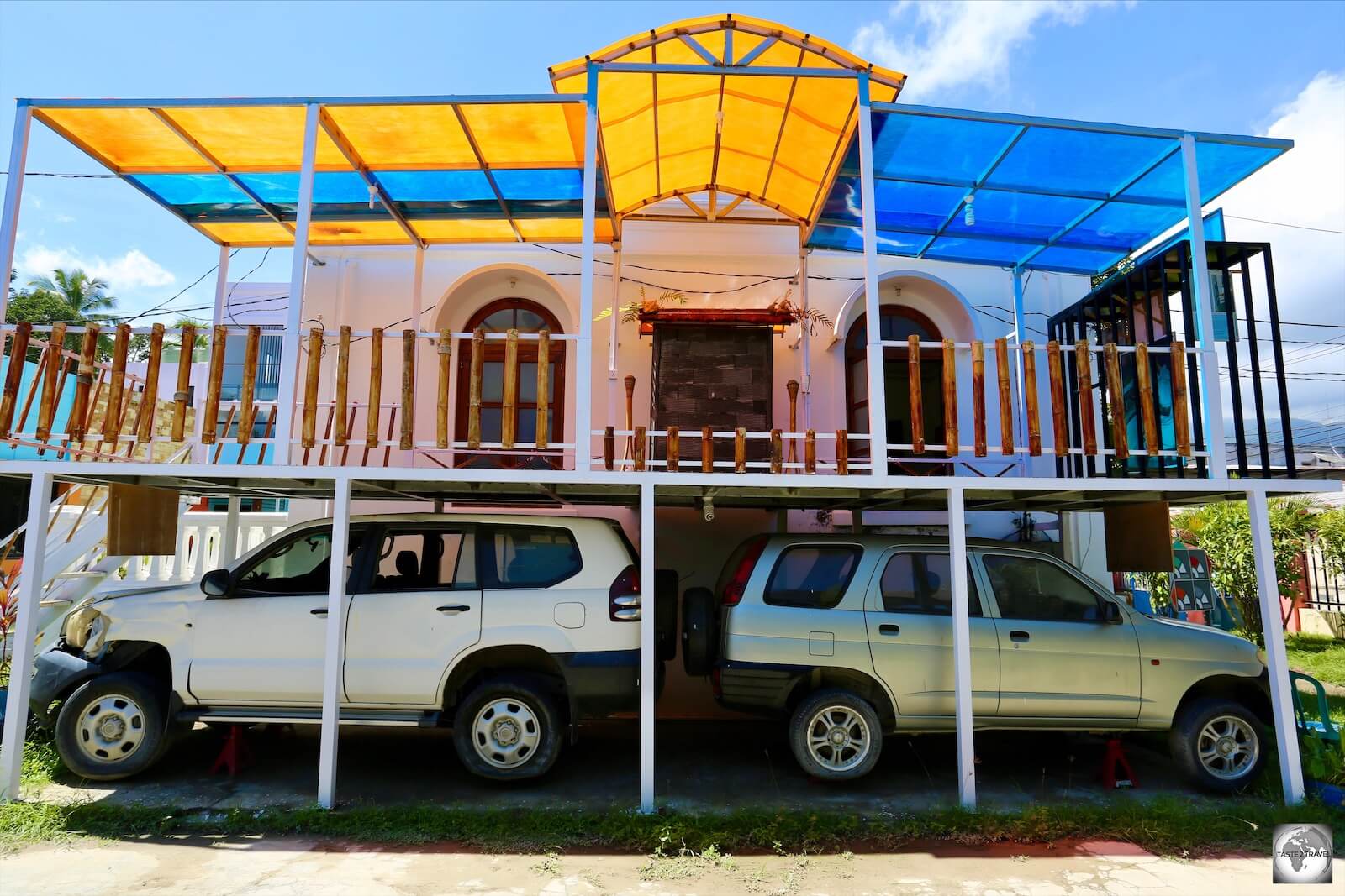 The two, very unpretentious, Presidential cars which were once owned by Xanana Gusmão. The one on the left still bears the scars (and bullet marks) of a failed ambush.