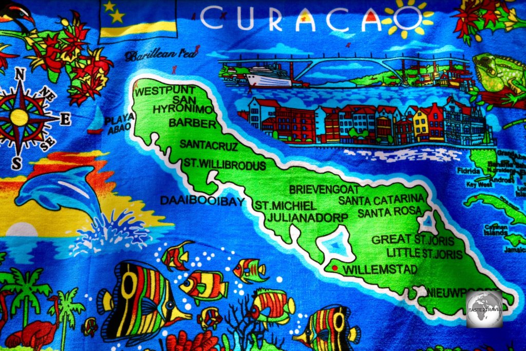 A colourful map of Curaçao adorns a souvenir beach towel.
