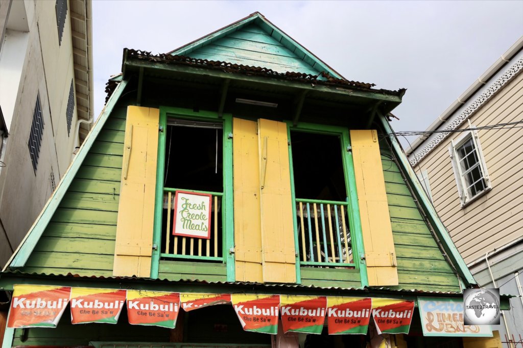 A typical wooden building in downtown Roseau, Dominica.