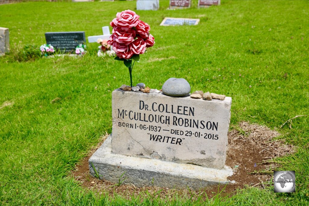 The simple gravesite of Colleen McCullough, a famous Australian author who was a prominent resident of Norfolk Island.