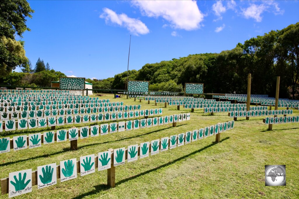 A park in Burnt Pine displays the handprints of islanders who have put their 'Hands Up for Democracy'.