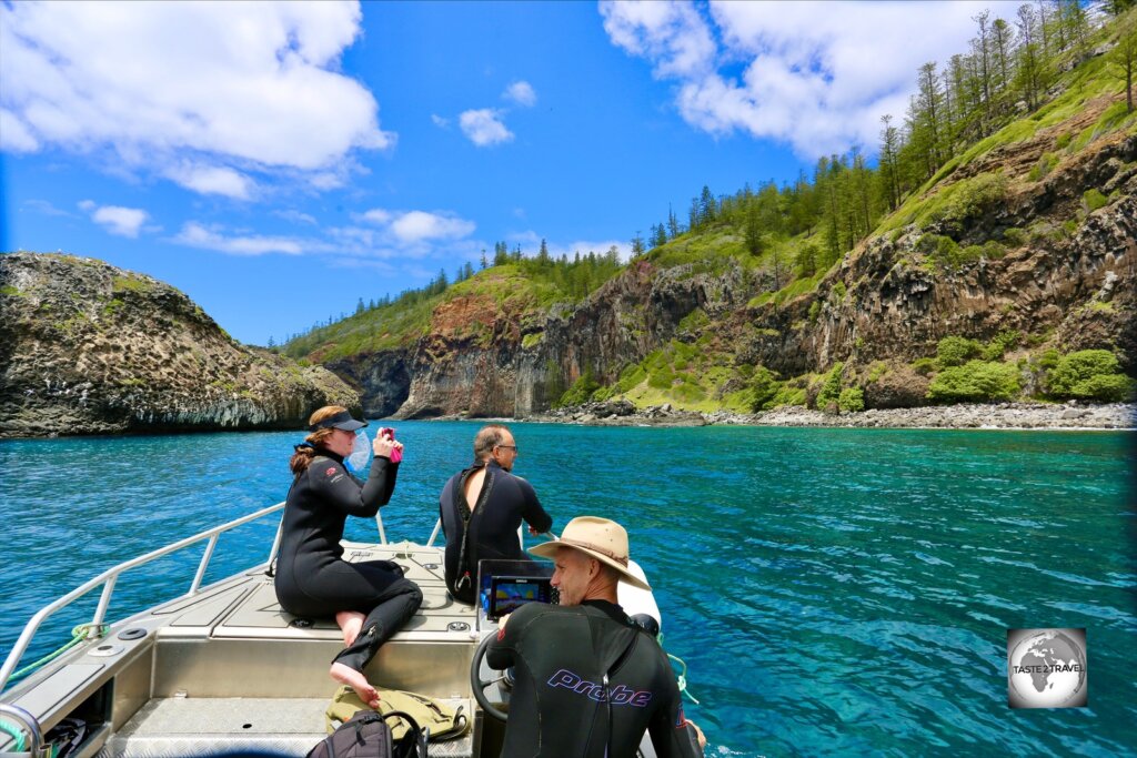 Mitch and my two dive buddies, Sara and John, admiring the impressive volcanic formations on the north coast of Norfolk Island.