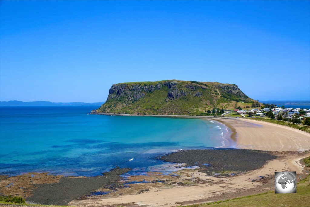 A view of Godfrey's beach and 'The Nut', an ancient volcanic plug which looms over the small north coast town of Stanley.